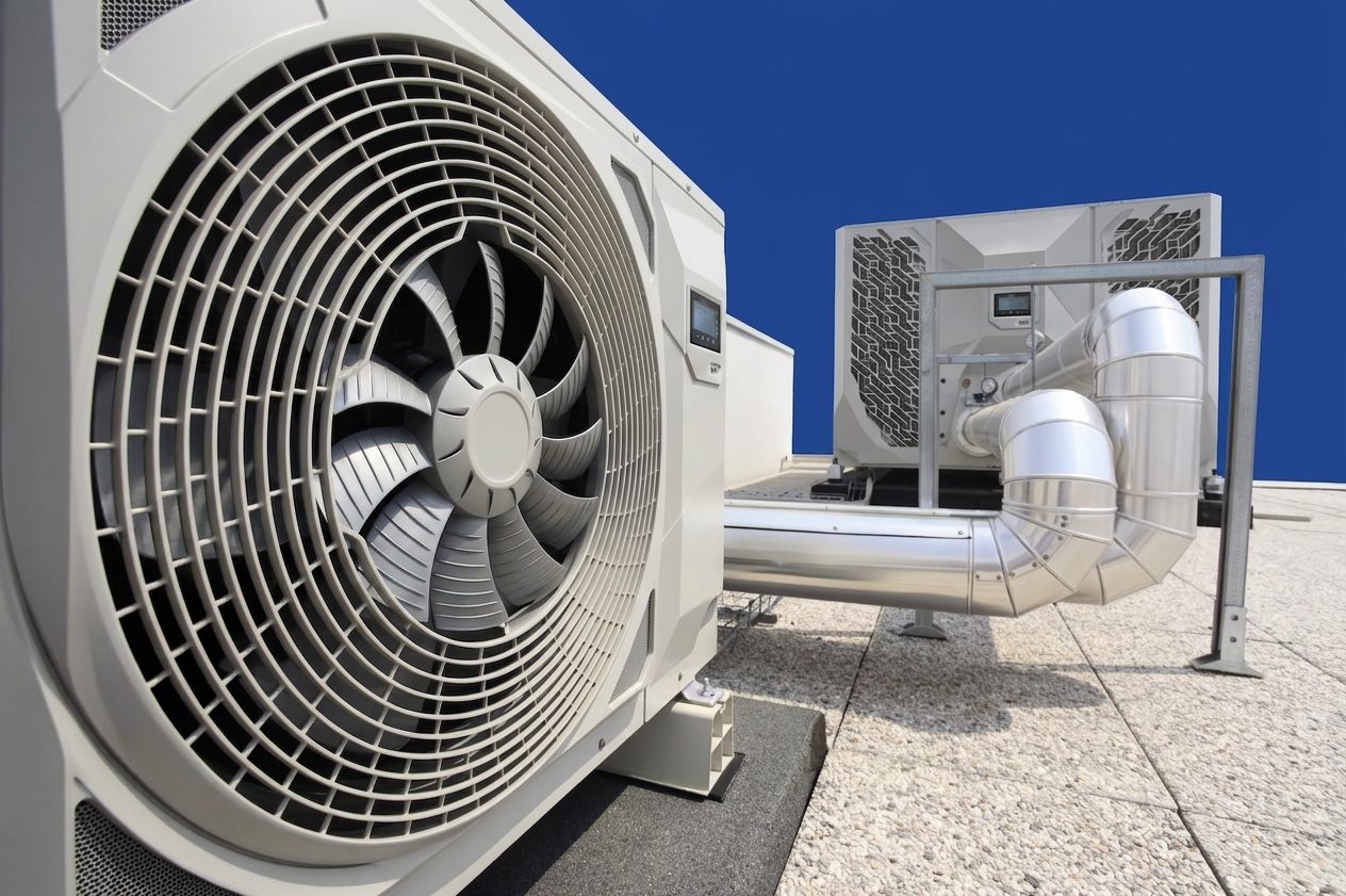 Rooftop condenser units and ductwork on a commercial building